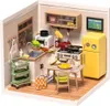 A miniature dollhouse kitchen scene with furniture and accessories. Podgląd zdjęcia produktu