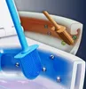 A close-up illustration of two toilet brushes cleaning a toilet bowl, one blue and one orange, with water and particles shown. Produktbild-Vorschau