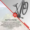 An e-bike is shown against a mountain landscape background, with a red diagonal overlay containing text. Produktbild-Vorschau