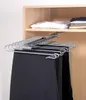 A pull-out closet organizer for pants is shown in a closet. Produktbild-Vorschau