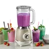 A vintage-style blender with several colorful smoothies in glasses around it. Produktbild-Vorschau