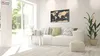 A modern living room with a white sofa, a coffee table, and a world map artwork on the wall. Anteprima dell’immagine prodotto