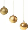 Three gold Christmas ornaments hang from thin strings against a white background. Anteprima dell’immagine prodotto