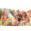 People having a barbecue in a backyard. Podgląd zdjęcia produktu