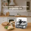 A kitchen counter with an egg cooker, toast, eggs, and coffee. Produktbild-Vorschau