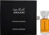 A black box containing a perfume bottle is shown next to the perfume bottle itself. Voir les images du produit