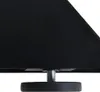 A close-up view of the bottom of a black table leg with an adjustable screw foot. Podgląd zdjęcia produktu