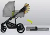 A gray baby stroller is shown in profile, with an arrow indicating it can be folded. A folded stroller is shown on the right. Anteprima dell’immagine prodotto