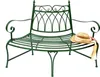 A green metal garden bench with a straw hat and scarf on the seat, isolated on a white background. Náhľad obrázku produktu