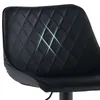 A close-up view of the backrest of a black bar stool with diamond quilting. Produktbild-Vorschau
