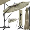 A display of a large cantilever umbrella, its cover, and a folded umbrella. Anteprima dell’immagine prodotto