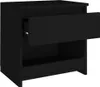 A black nightstand with one drawer partially open. Anteprima dell’immagine prodotto