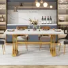 A dining table set in a modern dining room. Voir les images du produit