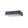 A product shot of a black and white light fixture. Produktbild-Vorschau