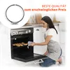 A woman is taking a tray of baked goods out of an oven. Produktbild-Vorschau