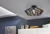 A modern interior scene with a geometric ceiling light fixture. Produktbild-Vorschau