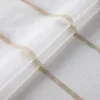 A close-up view of white sheer curtains with beige stripes. Produktbild-Vorschau