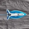 An iron on wrinkled fabric. Produktbild-Vorschau