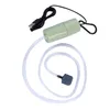 A USB powered aquarium air pump with tubing and an air stone. Podgląd zdjęcia produktu