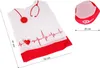 A doctor's costume accessory, likely a vest or cape, with a stethoscope and heart monitor design, shown flat. A small red cap is also visible. Produktbild-Vorschau