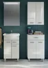 A modern bathroom vanity set with a sink and cabinets against a teal wall. Produktbild-Vorschau