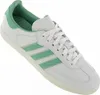 A single Adidas Samba sneaker with green stripes and accents on a white background. Produktbild-Vorschau