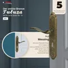 A marketing image showcasing a bronze door handle set with descriptive text and branding. Produktbild-Vorschau