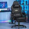 A black gaming chair with gold accents is shown in a room with a computer setup and shelves in the background. Anteprima dell’immagine prodotto