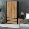 A bedroom scene featuring a wardrobe and a nightstand with a lamp. Produktbild-Vorschau