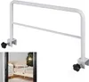 A white metal bed rail is shown against a white background. A smaller inset image shows the bed rail installed on a bed. Produktbild-Vorschau