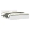 A white bed frame with a headboard and drawers, shown from a side angle with bedding. Anteprima dell’immagine prodotto