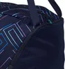 A close-up view of a navy blue duffel bag with a geometric pattern in shades of purple, blue, and pink. Produktbild-Vorschau