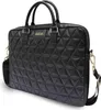 A black quilted laptop bag with gold hardware and a shoulder strap. Náhľad obrázku produktu