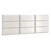 A white upholstered headboard composed of six rectangular panels arranged in a 3x2 grid. Anteprima dell’immagine prodotto