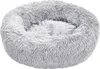 A round, fluffy pet bed in a light gray color, shown from a slightly elevated angle against a white background. Anteprima dell’immagine prodotto
