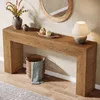 A wooden console table with decorative items and a lamp, placed in a hallway. Anteprima dell’immagine prodotto
