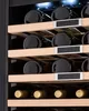 A close-up view of shelves inside a wine cooler, filled with bottles. Produktbild-Vorschau