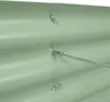 Close-up of a green corrugated metal raised garden bed with a silver bolt and nut assembly being inserted. Produktbild-Vorschau