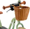 Close-up of the handlebars and front basket of a child's bicycle. Náhled obrázku produktu