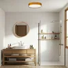 A modern bathroom with a wooden vanity, sink, mirror, and a shower stall. Produktbild-Vorschau