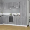 A modern kitchen with gray wood-effect cabinets and appliances. Podgląd zdjęcia produktu