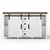 A white sideboard with a brown top and black sliding barn doors and handles, presented on a white background. Voir les images du produit