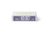A white digital alarm clock with a gray display is shown against a white background. Podgląd zdjęcia produktu