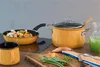 A kitchen scene with cooking utensils and ingredients. Podgląd zdjęcia produktu