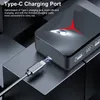 A close-up shot of a black charging case for wireless earbuds, with a USB-C cable plugged in. Náhľad obrázku produktu