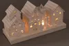 A white wooden Christmas village scene with LED lights. Podgląd zdjęcia produktu