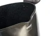 Close-up of the rim and interior of a dark-colored pot with a speckled pattern. Produktbild-Vorschau