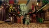 Two LEGO characters, Harry Potter and Hagrid, stand on a cobblestone street in a LEGO version of Diagon Alley. Podgląd zdjęcia produktu