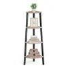 A four-tier corner shelf unit with a wood-grain finish and black metal frame, decorated with a potted plant, a framed picture, books, and decorative boxes. Produktbild-Vorschau