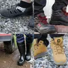 A collage of different types of work and safety footwear. Produktbild-Vorschau